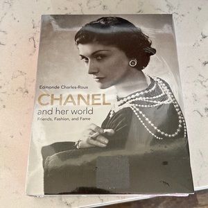 New still in plastic Chanel and her world coffee table book, perfect condition